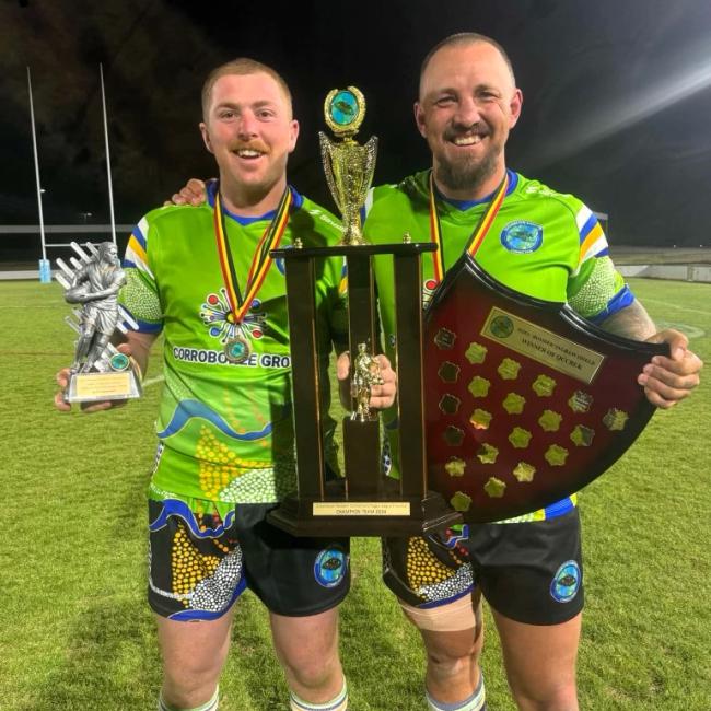 Ryan Dodson with Football Trophy