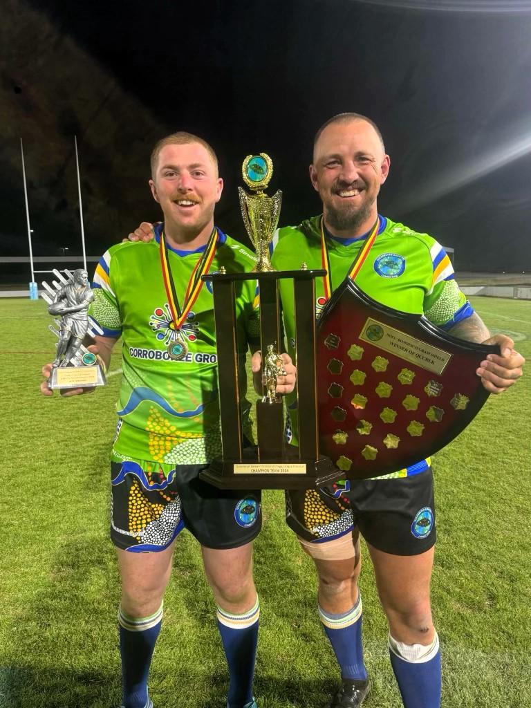 Ryan Dodson with Football Trophy