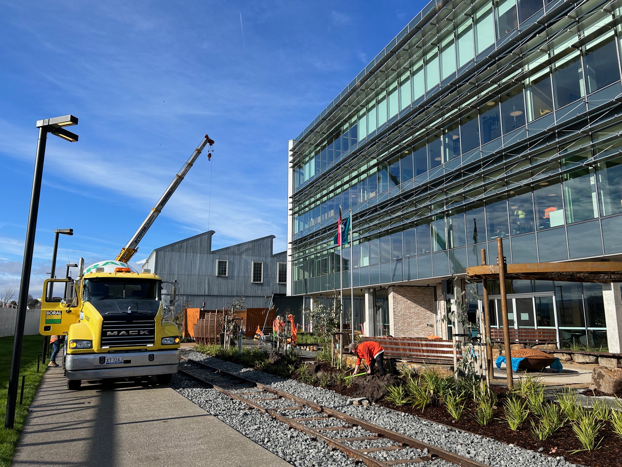 Scapeform completed external landscaping with Boral's decorative exposed concrete at the River's Edge building in Tasmania