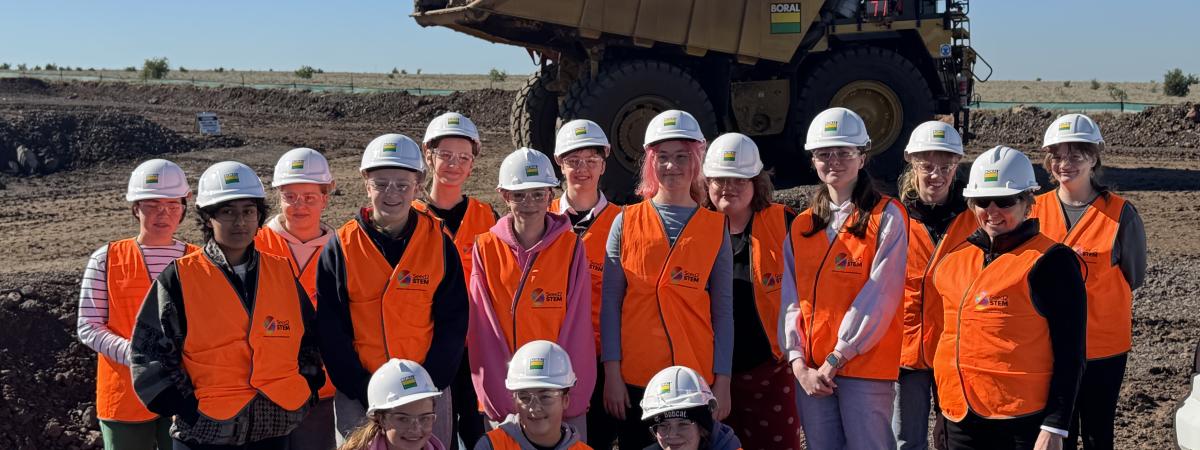 Students with haul truck at Deer Park quarry