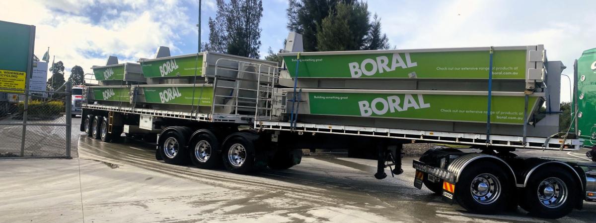 Wet Concrete Skip Bins loaded on Boral recycling truck