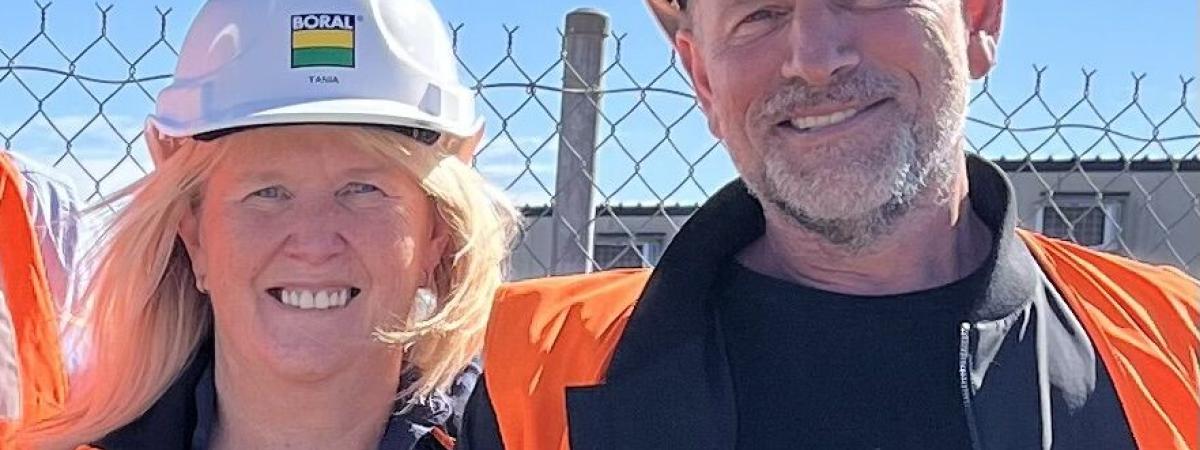 Tania O'Neill with colleague on site in PPE