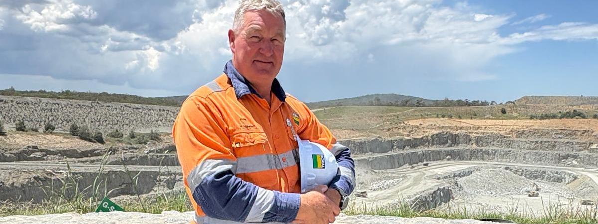 Boral employee Frank Lourey in PPE standing at quarry site