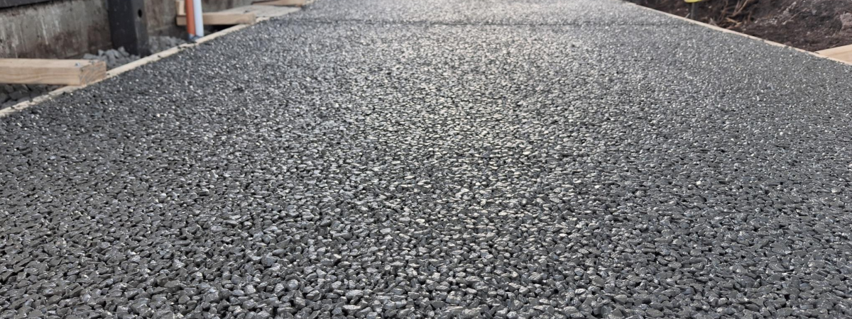 footpath winding through trees made with permeable concrete