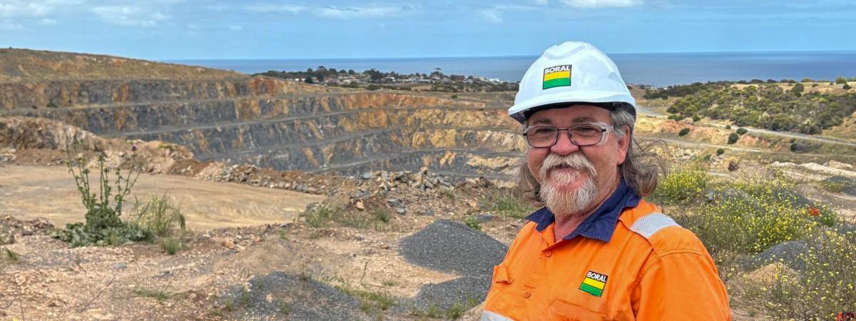 Boral employee standing in orange PPE at Linwood quarry in South Australia