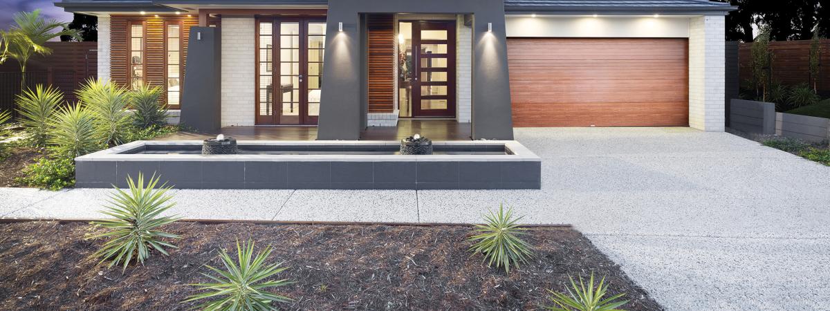 Exposed aggregate concrete on driveway and footpath of luxurious home