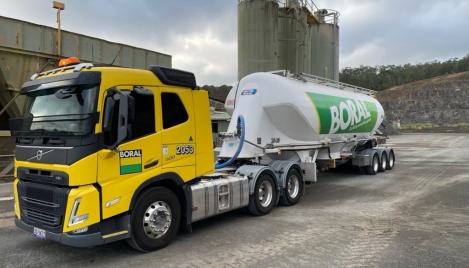 Cement tanker parked in front of batching plant