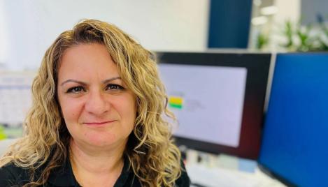 Photo of Michelle Schultze at desk