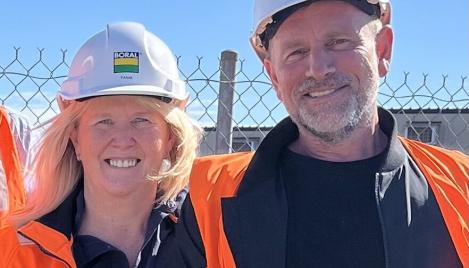 Tania O'Neill with colleague on site in PPE