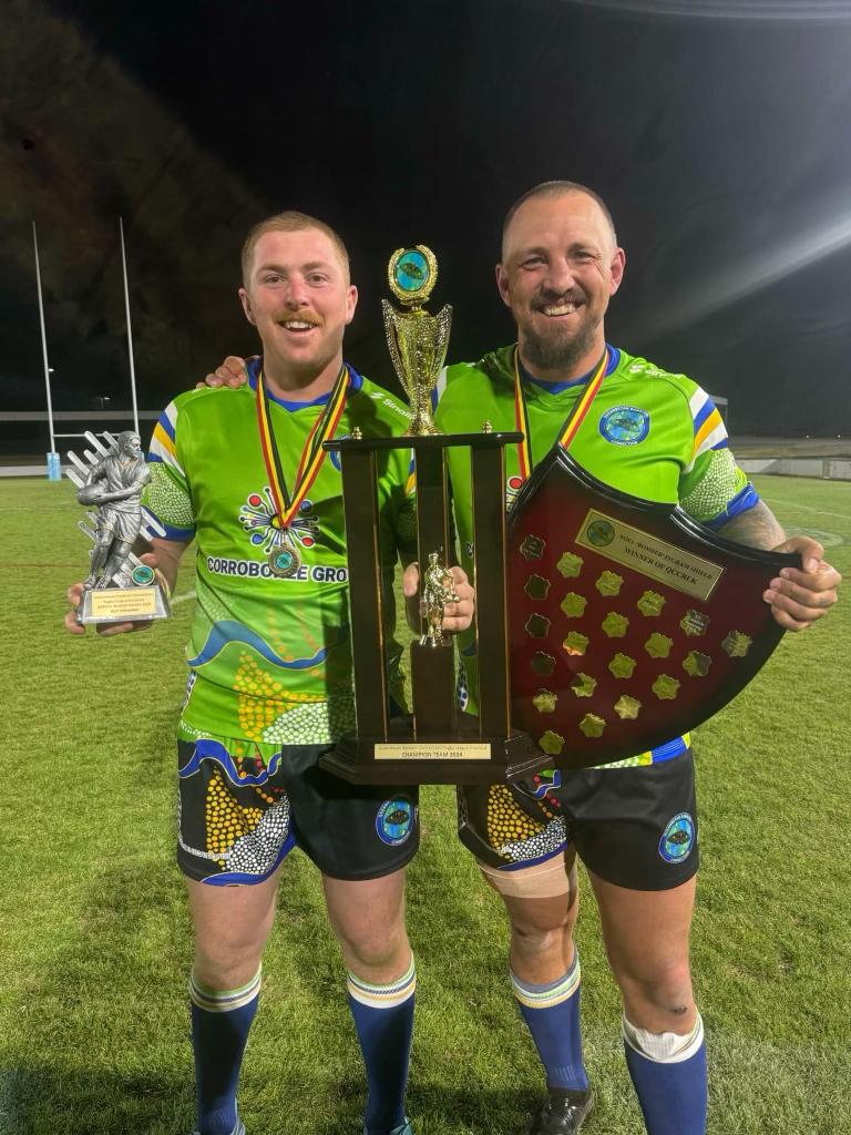 Ryan Dodson with Football Trophy