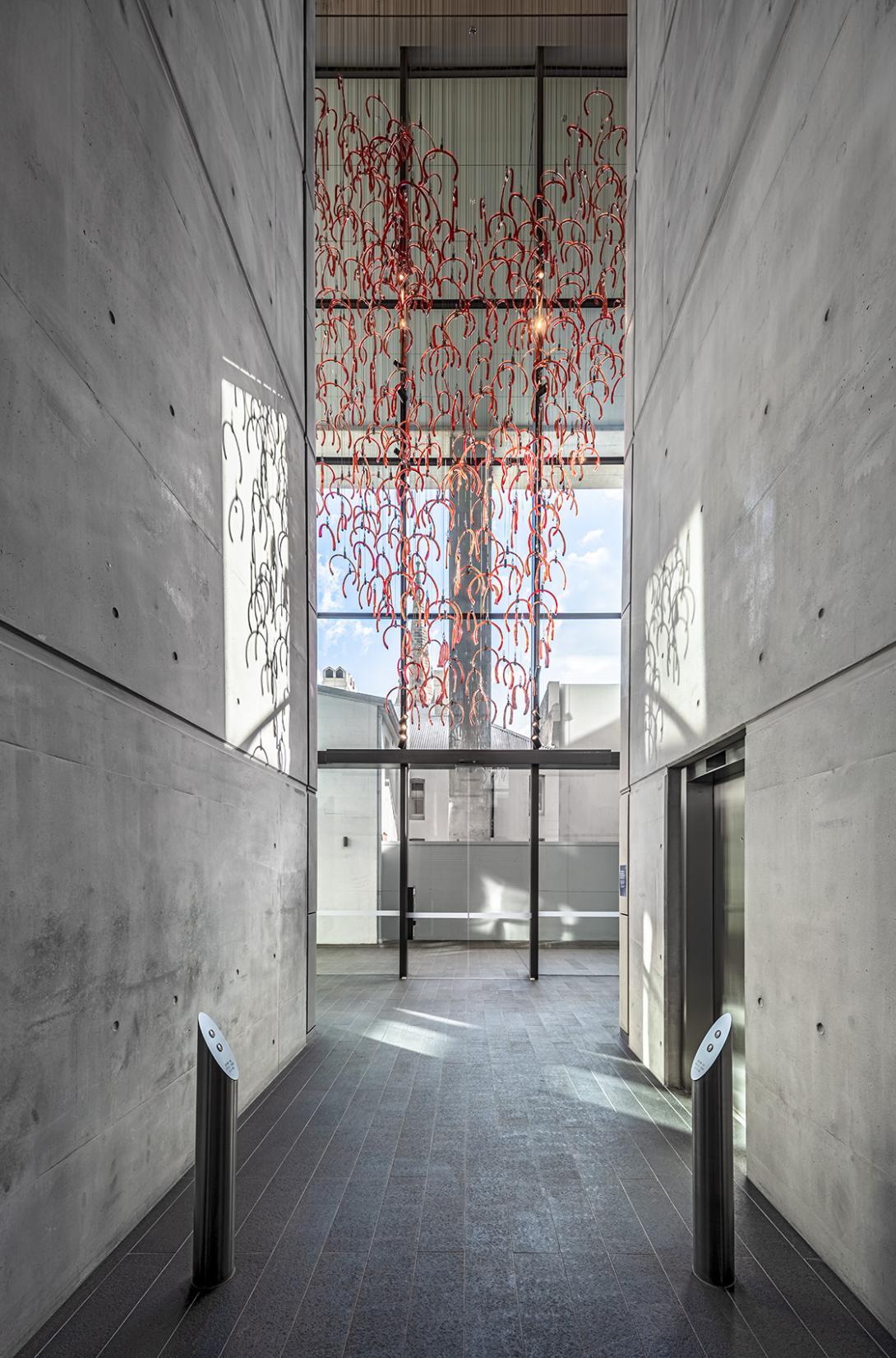 Interior shot of Duo showing exposed concrete walls and floors