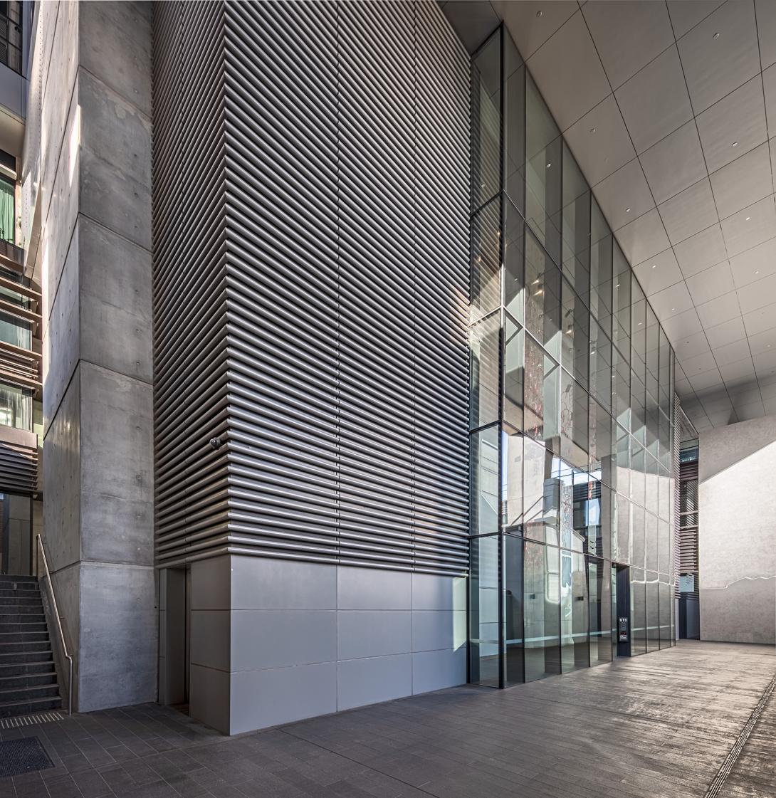 Interior shot of Duo showing exposed concrete walls and floors