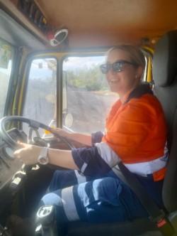 Hanna Moriconi driving a water truck