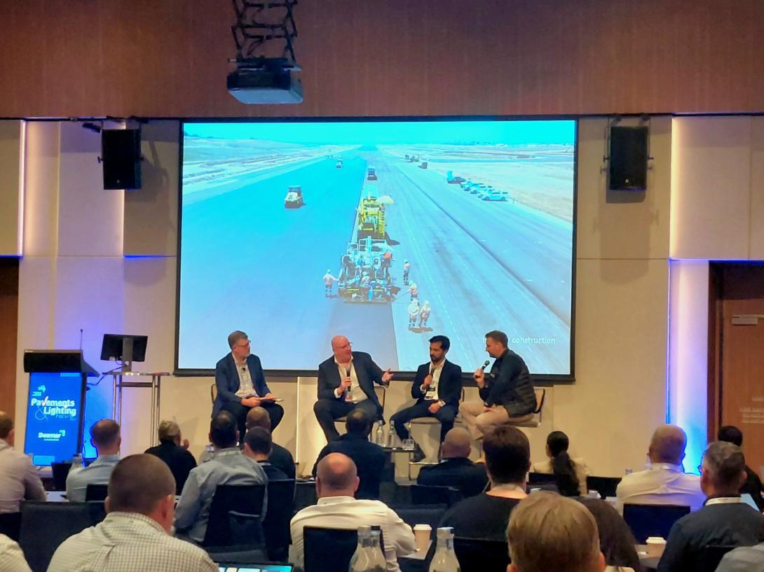 AAA conference 2025 - panel on stage with image of Western Sydney Airport