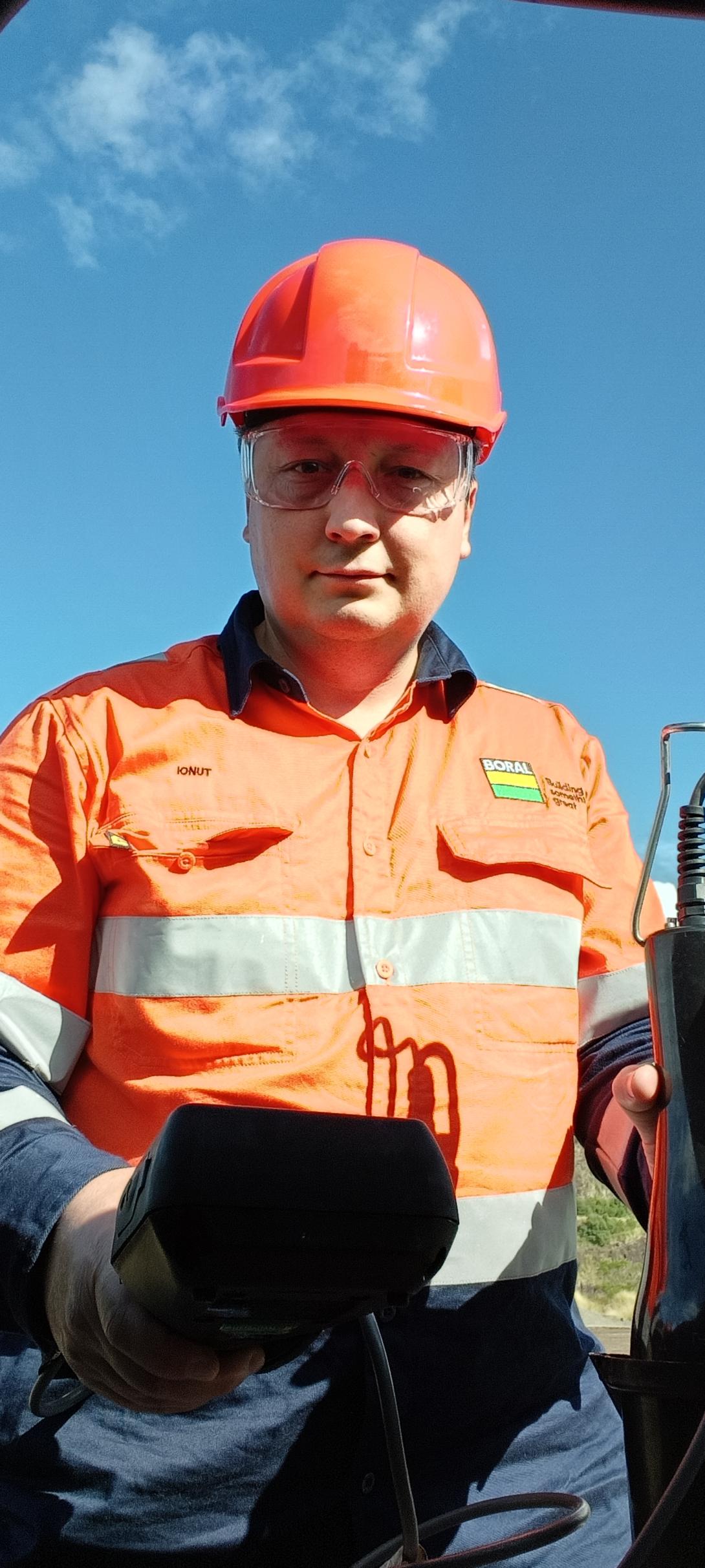 Boral employee in hard hat and PPE