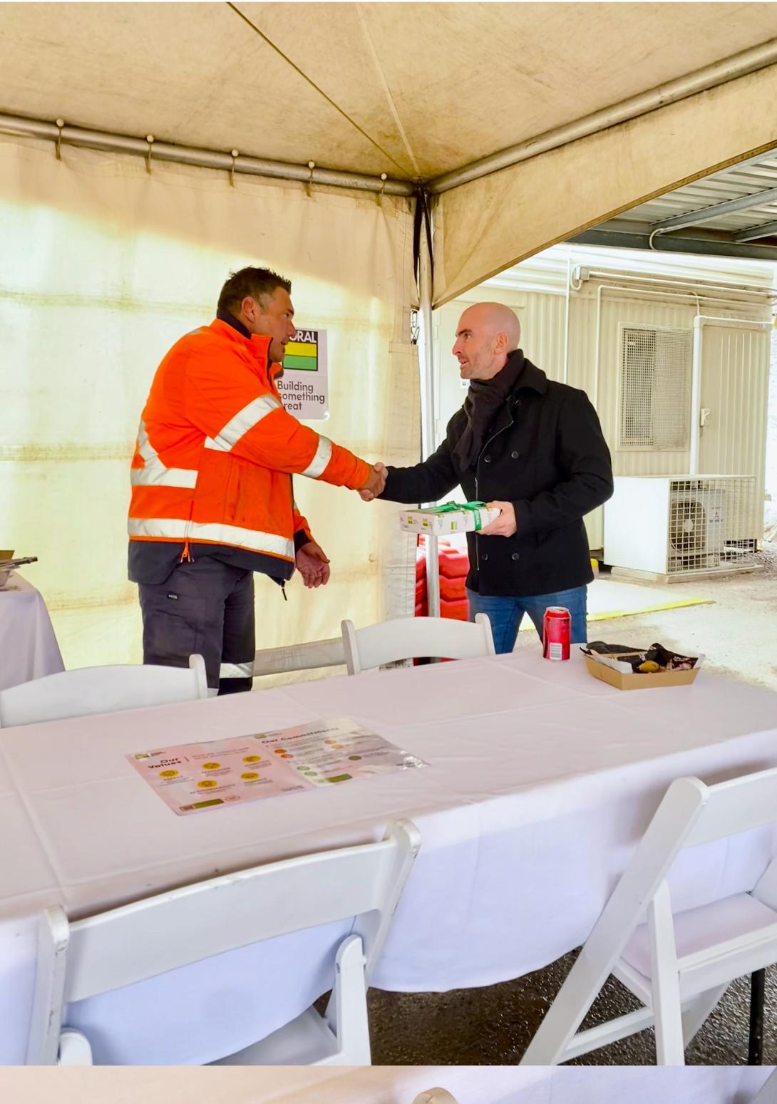 Boral employees shaking hands