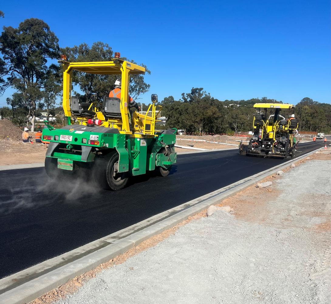 Asphalt paver laying road in Brisbane