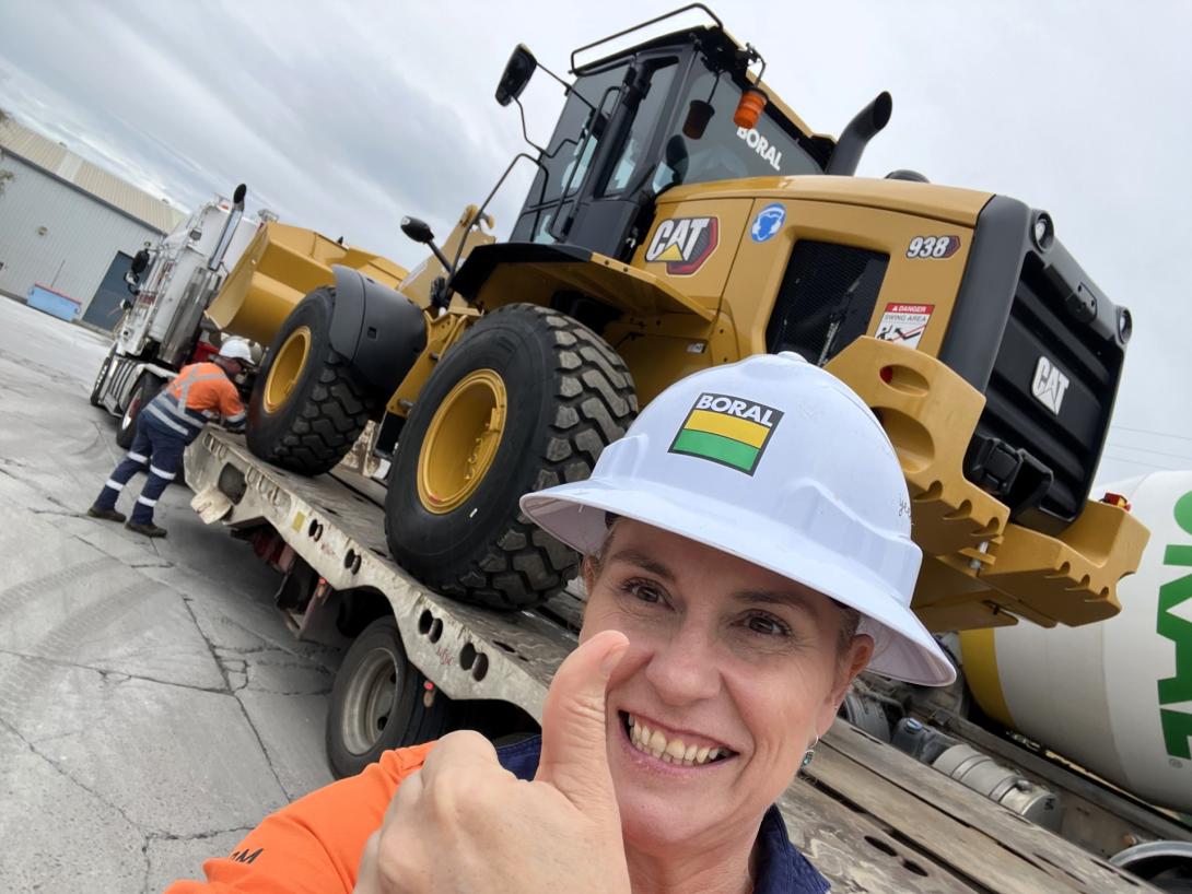 CAT excavator 938 on a truck being delivered to the Noosa plant