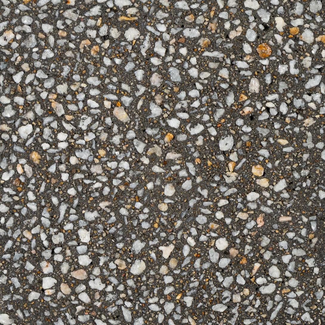 Tuxedo - – Exposé® exposed aggregate concrete in deep charcoal tone with bright white aggregates and Indian Ink oxide, ideal for driveways, patios and paths