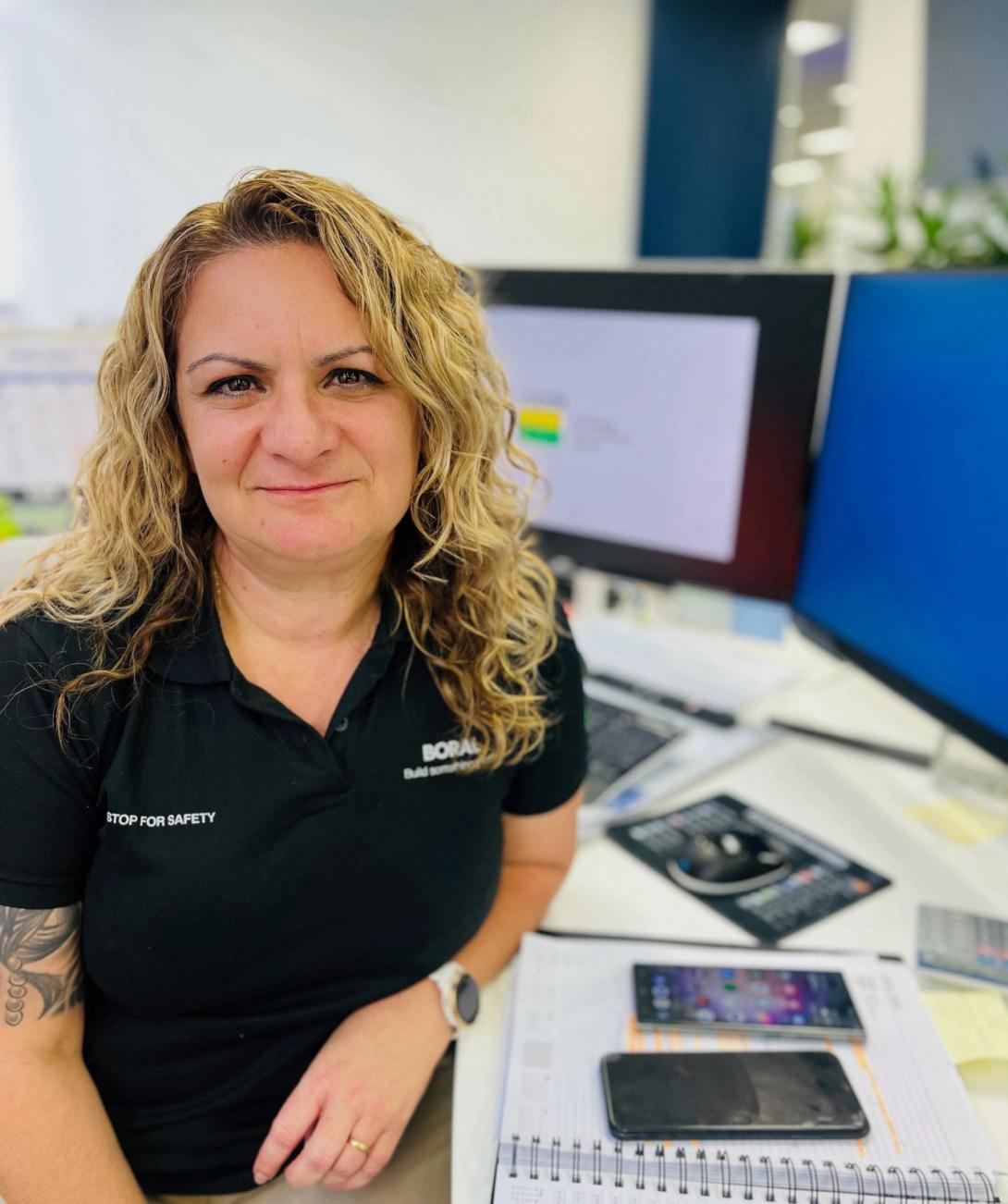 Photo of Michelle Schultze at desk