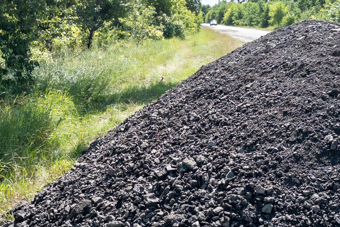 Roadbase pile by side of road