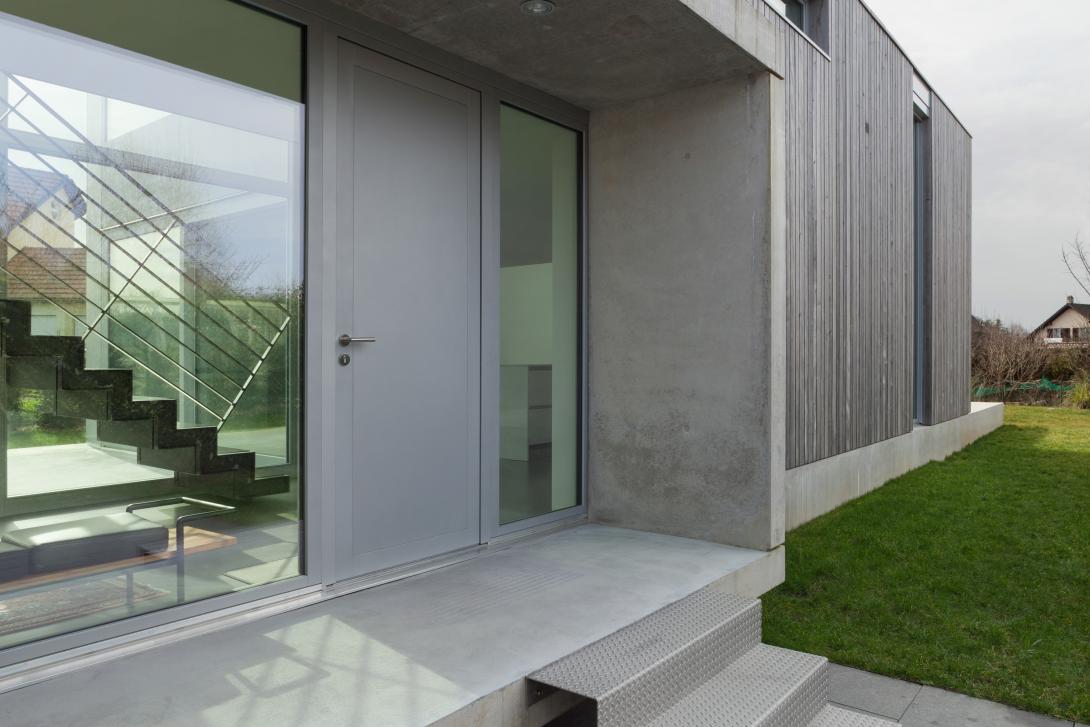 Concrete entry way to modern house